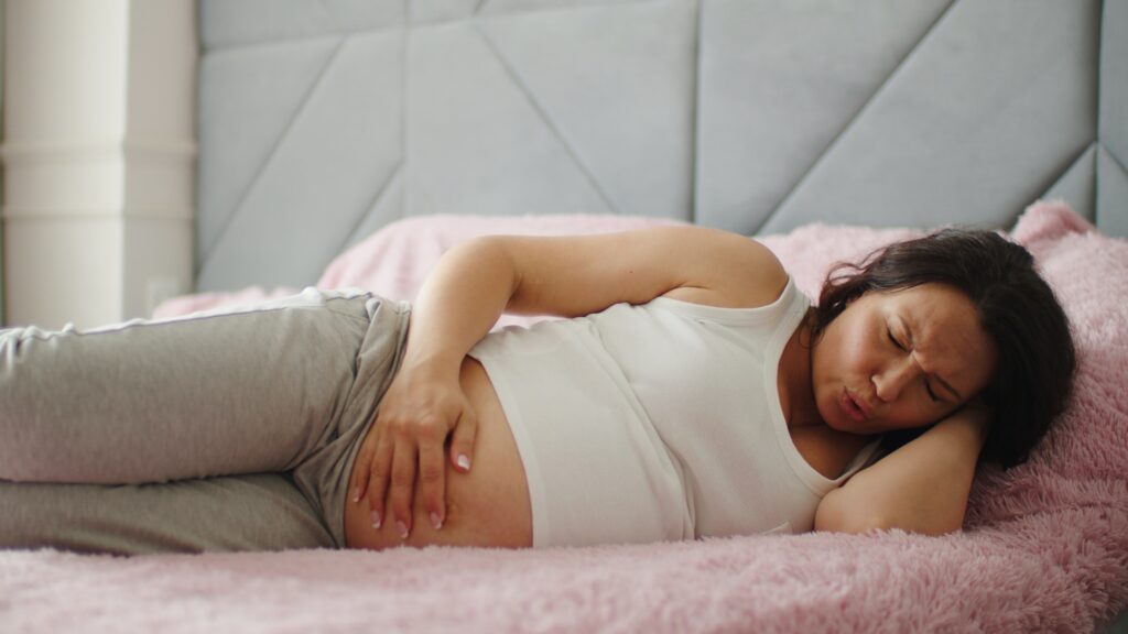 Expectant mother suffering from pregnant pain.