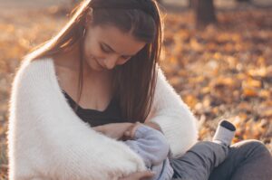 mom and breast feeding baby