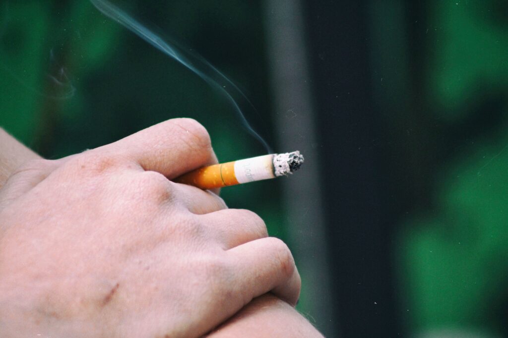 Cigarettes,smoking, smoke, smoking kills, bad habits, hand holding a cigarette, smokers, not healthy