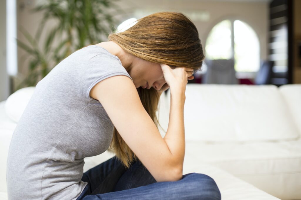 Sad woman in the room