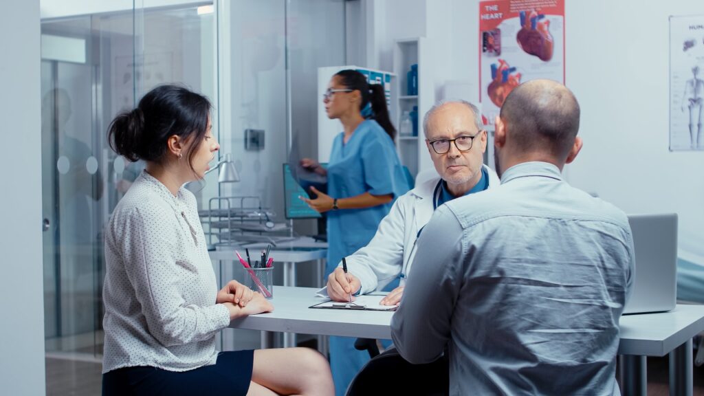 Young couple at doctor appointment