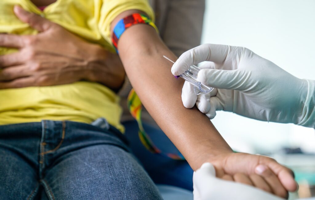 Doctor taking blood test from child patient. Healthcare, examination, kid concept