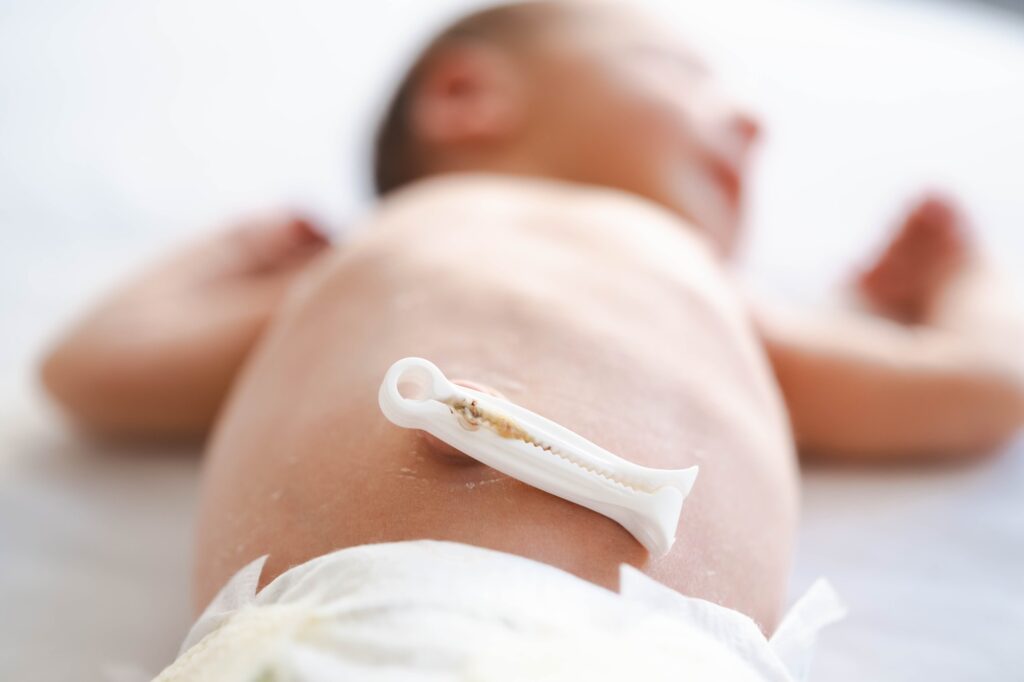 Defocused caucasian hairy brunet cute newborn baby