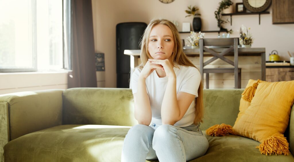 Boring and sad. Young woman worried, having psychological problem, feeling depression symptoms.