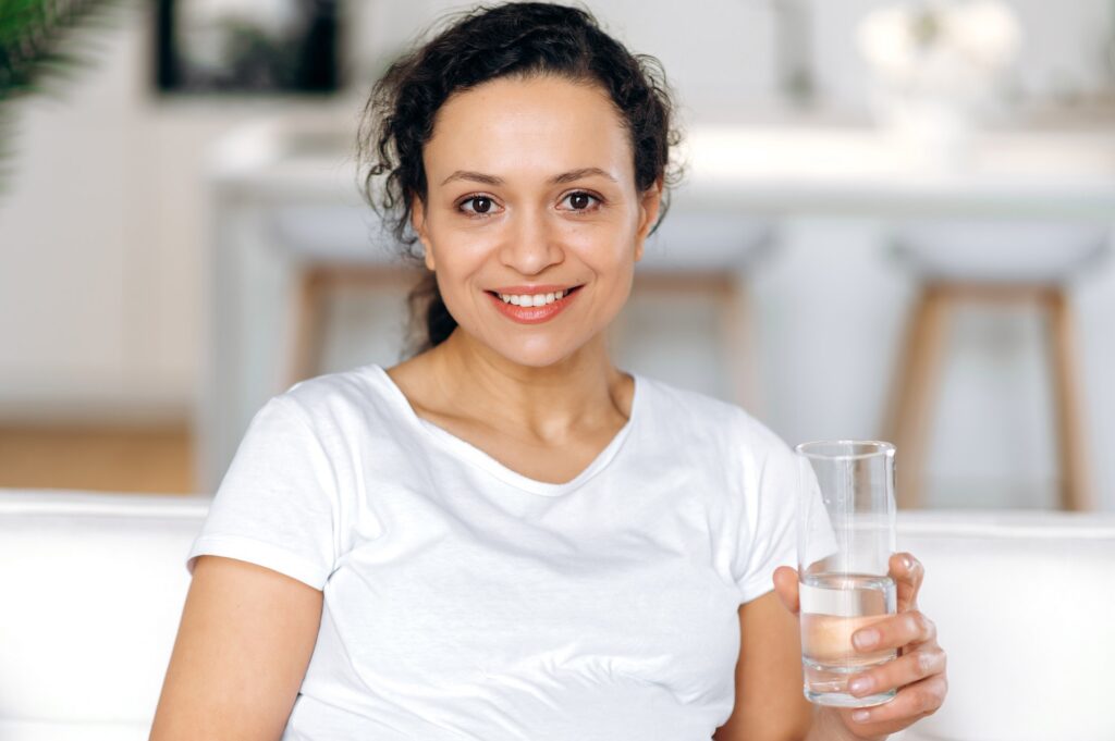 woman health water balance mixed race drink