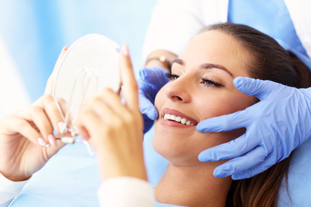 Adult woman having a visit at the dentist's