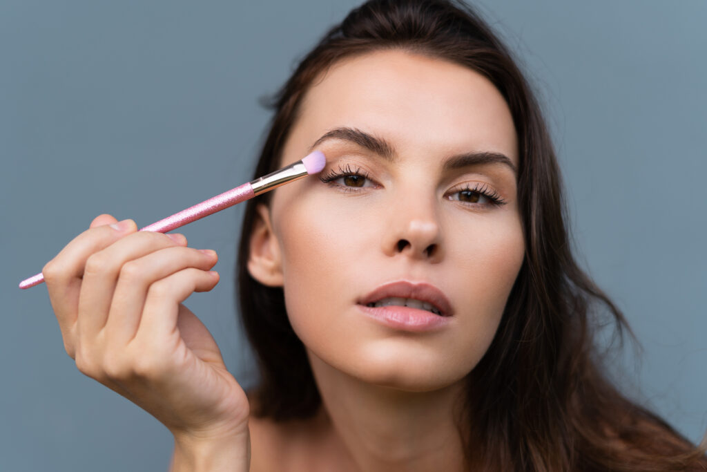 Beauty portrait of woman with perfect skin and natural makeup, full nude lips