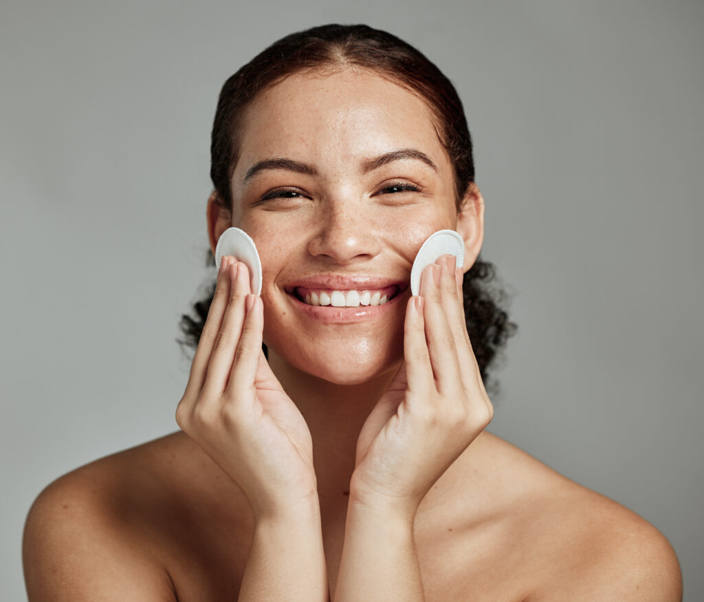 Skincare, beauty and portrait of a woman with cotton for face acne, cosmetic cleaning and dermatolo