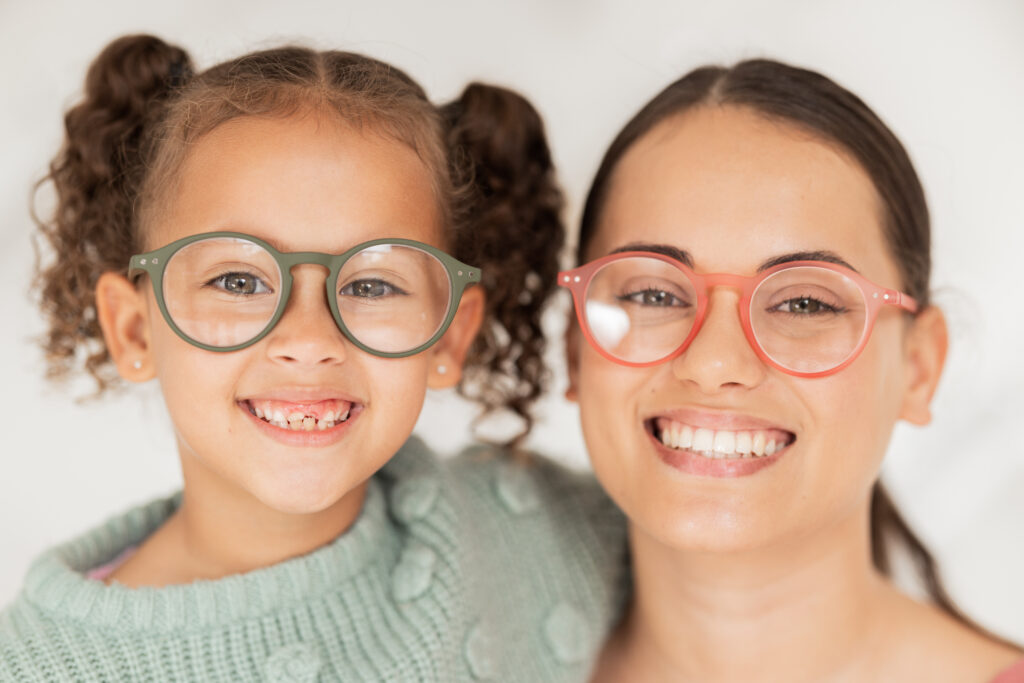 Portrait, mother and child with glasses for eye care wellness and healthy vision after an eye exam