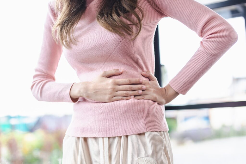 Woman was sick with stomach ache while having period. Healthy of woman concept