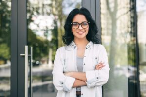 Confident woman standing on street