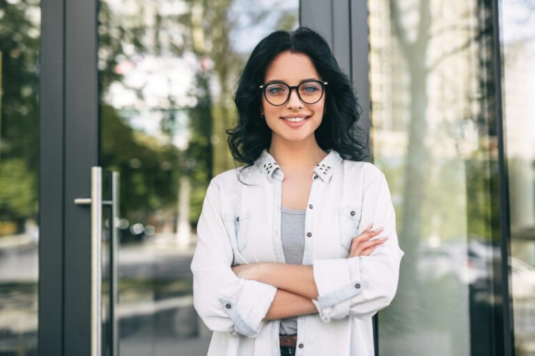 Confident woman standing on street