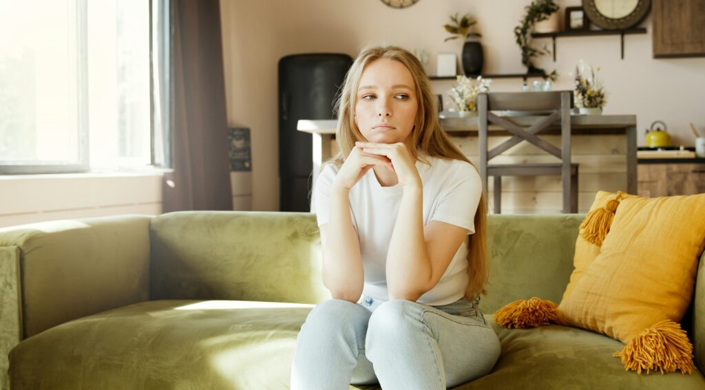 Boring and sad. Young woman worried, having psychological problem, feeling depression symptoms.