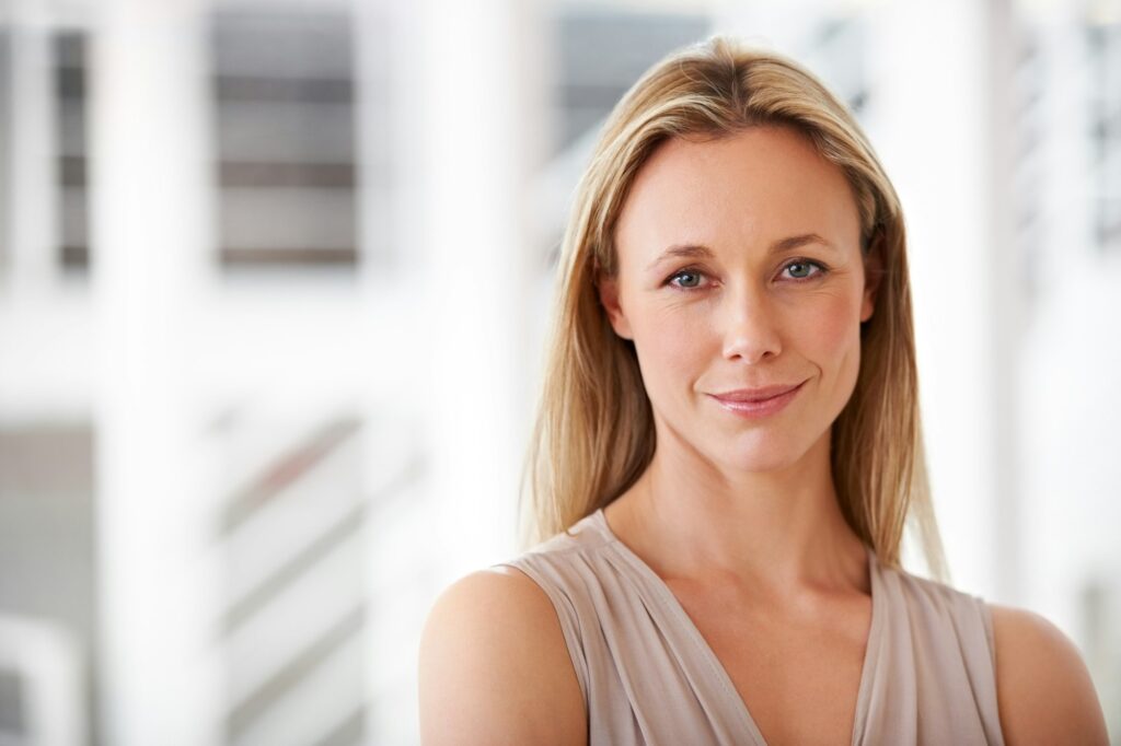 Innovative and ambitious. Portrait of an ambitious businesswoman standing in the office.
