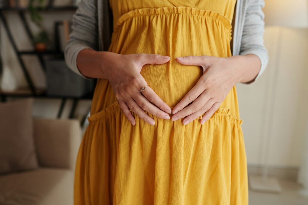 Pregnant woman expecting her baby with love
