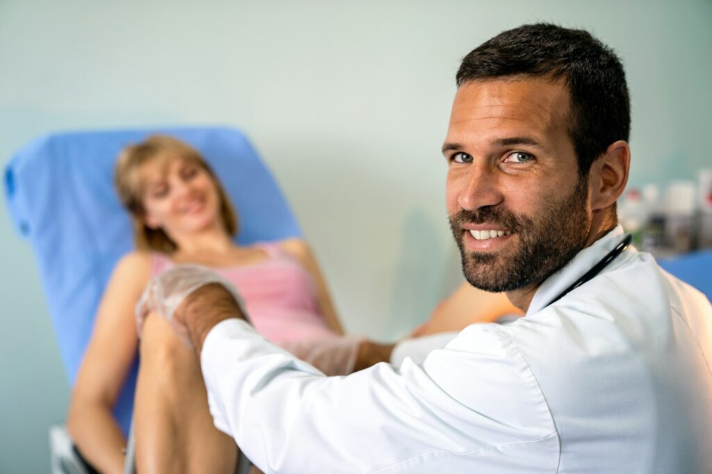 Gynecologist examination woman patient in a gynecological chair. Female health concept