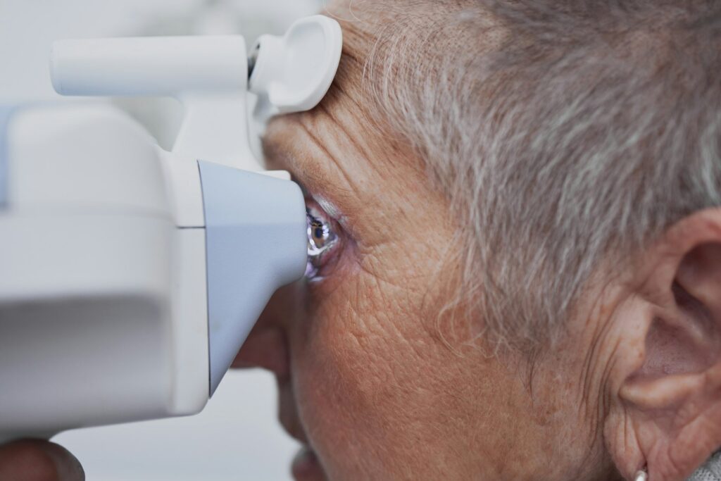 Optometry, eye exam and medical with old woman and consulting for healthcare, vision or glaucoma. O