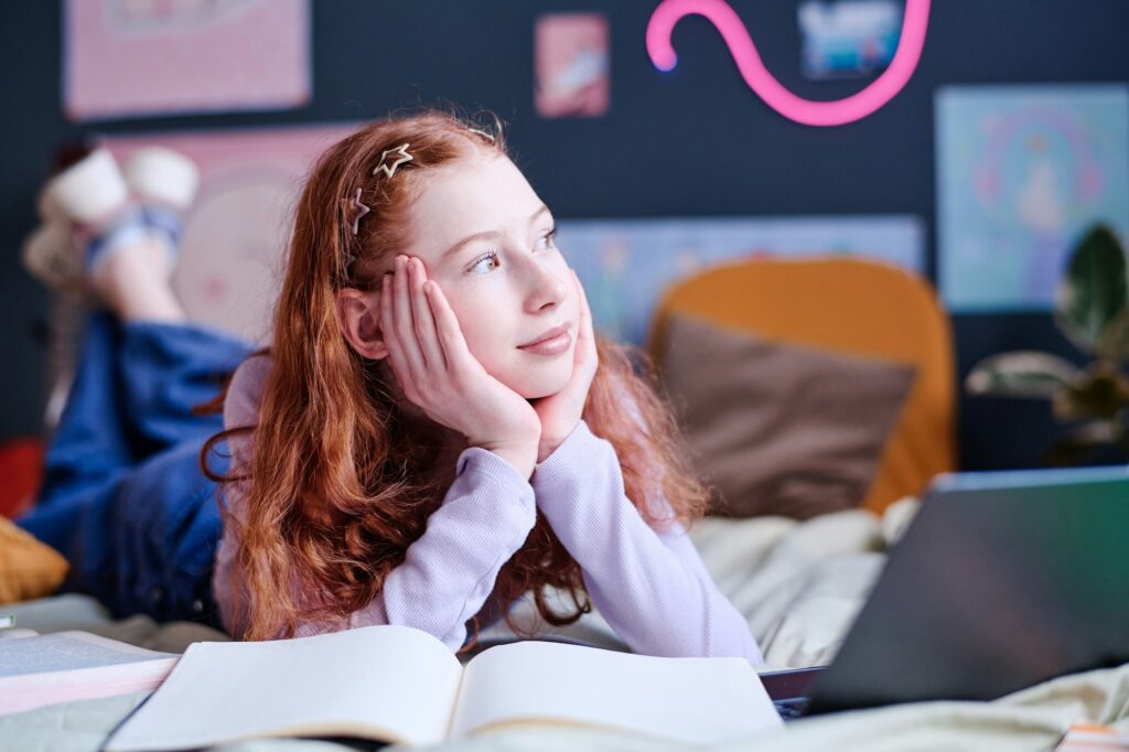 Teen Girl Looking Away While Daydreaming