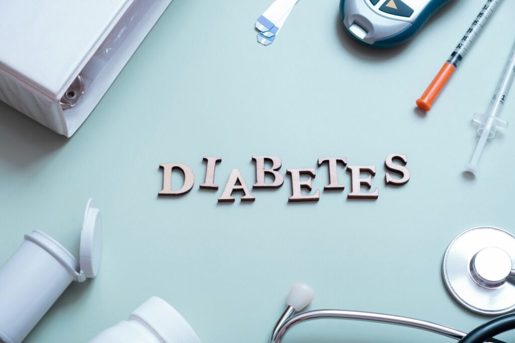 Inscription diabetes type 2 and glucometer, syringes and medical equipment